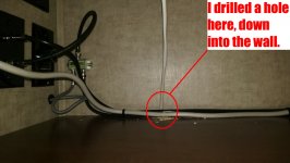 Routed wire from upper cabinet, down into side wall.jpg